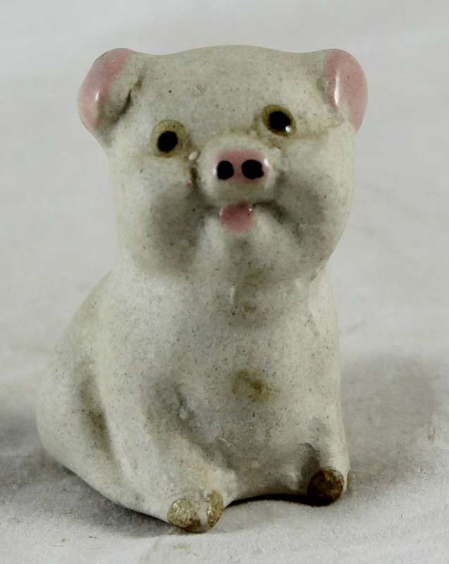 White smiling pig with pink ears