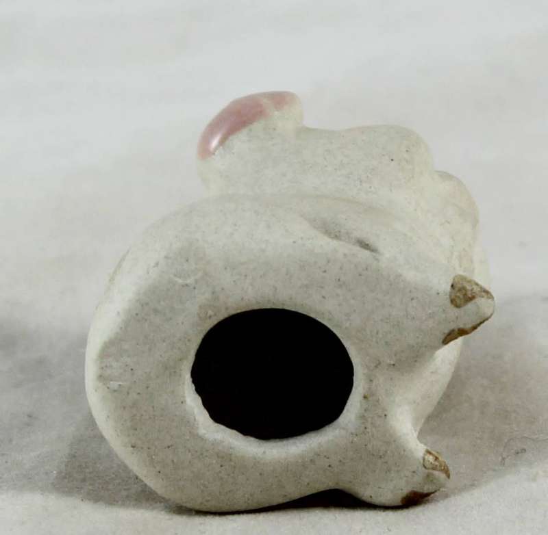 White smiling pig with pink ears