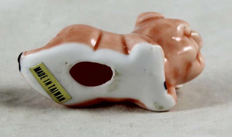 Pink pig laying down