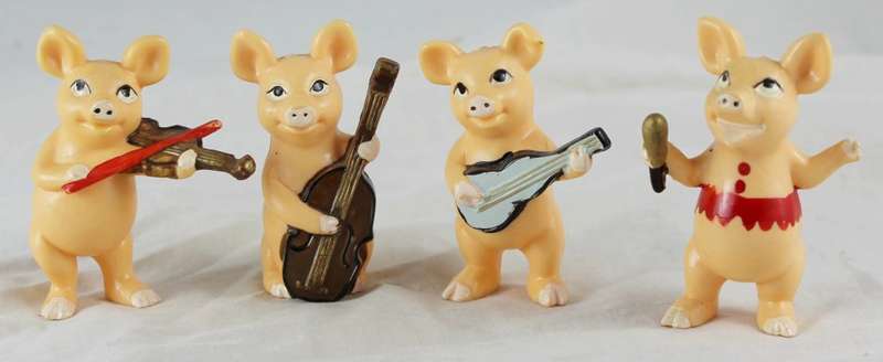 Plastic musical pigs - Set of four