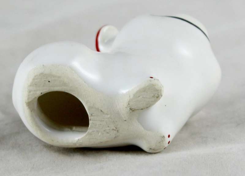 Wide smiling pig with red ears