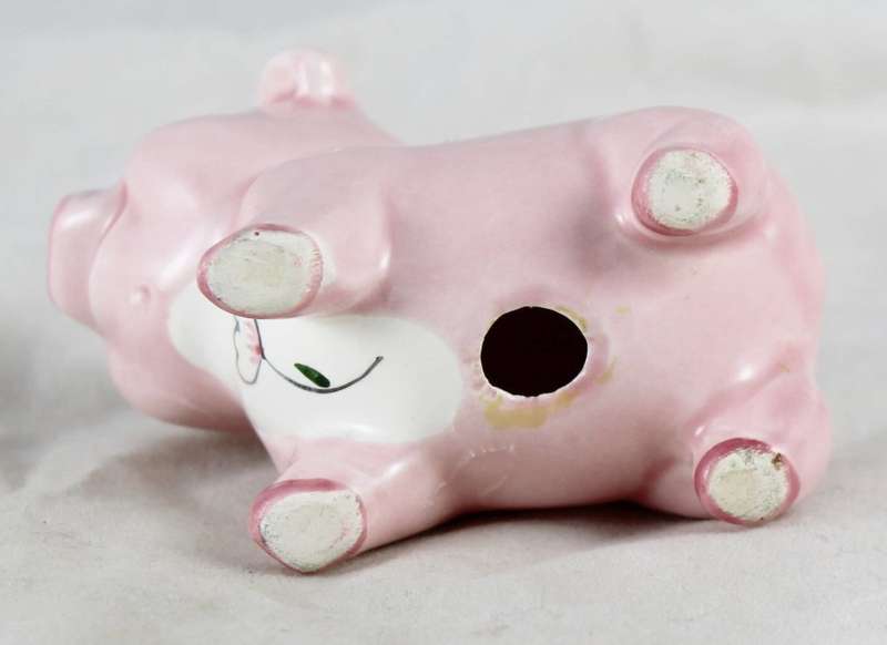 Pink pig with flower on chest