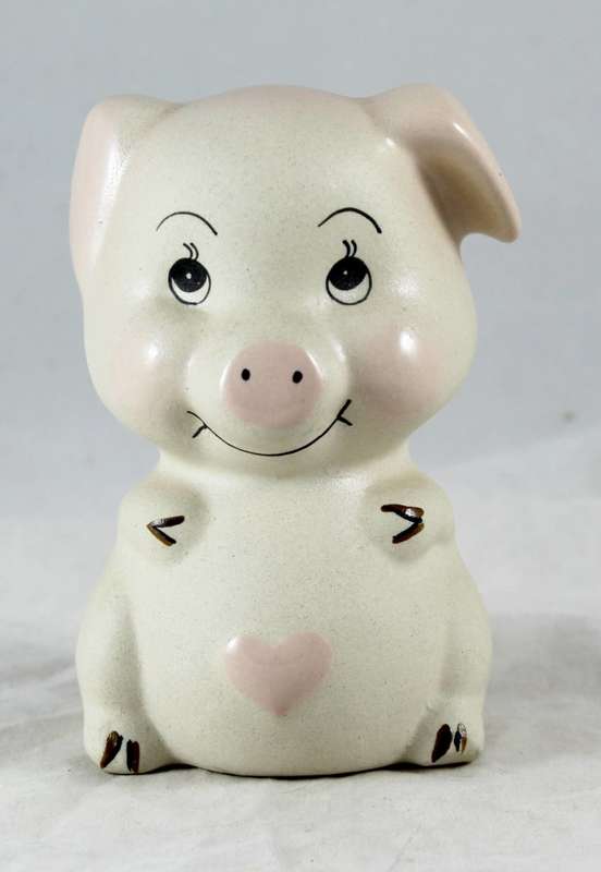 Beige pig with pink heart