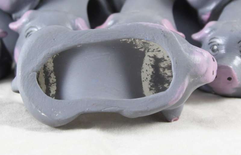 Grey pig serviette holders - set of eight