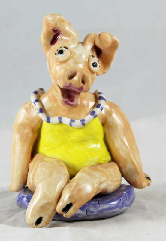 Hand made pig in swimming costume