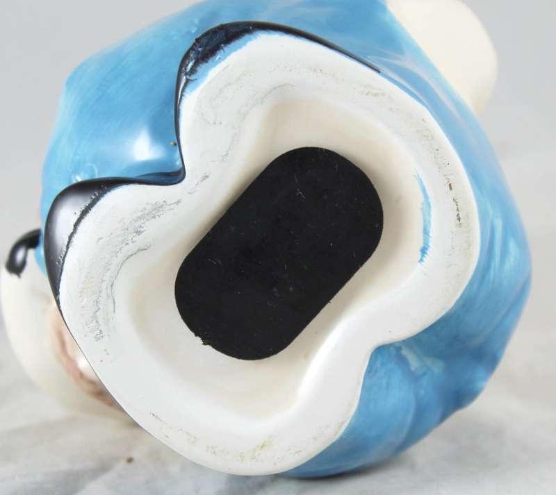 White pig in blue overalls - money bank