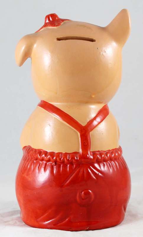 Large pig in red overalls - money bank