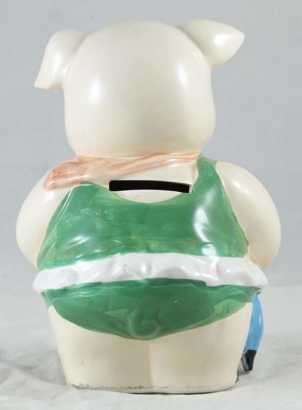 White pig in green dress - money bank
