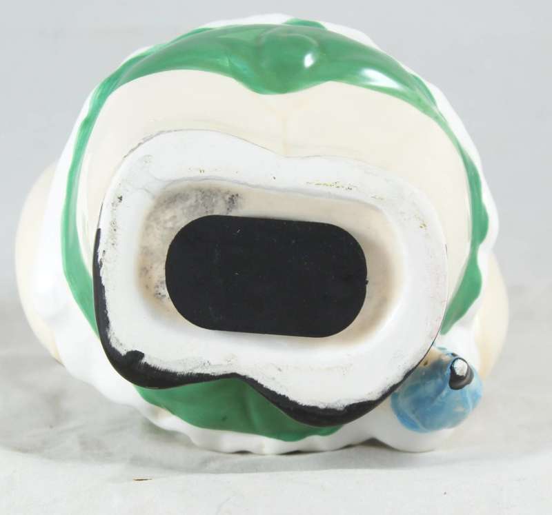White pig in green dress - money bank