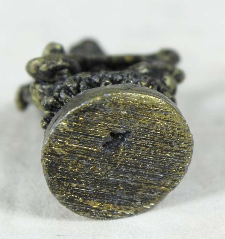 Miniature metal Eastern deity