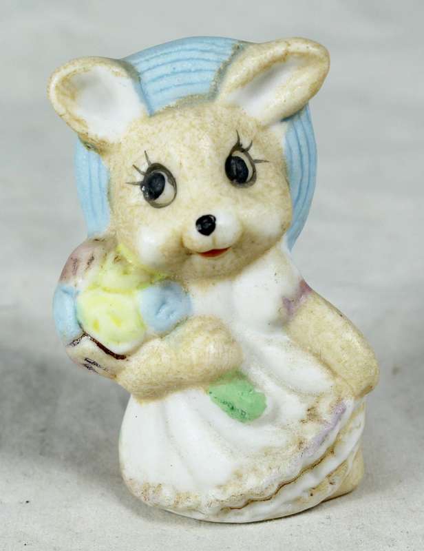 Miniature Rabbit Holding Flowers - Gorgeous!