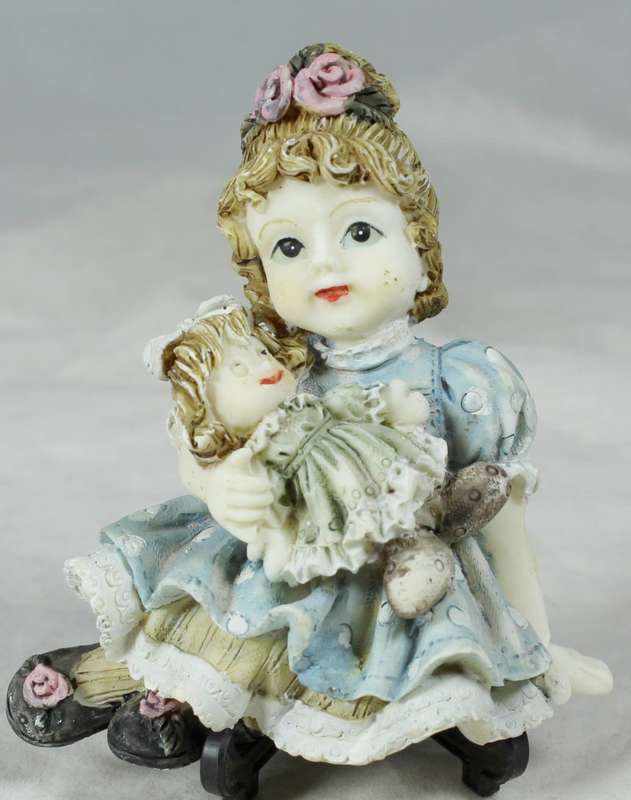 fridge magnet - little girl with doll
