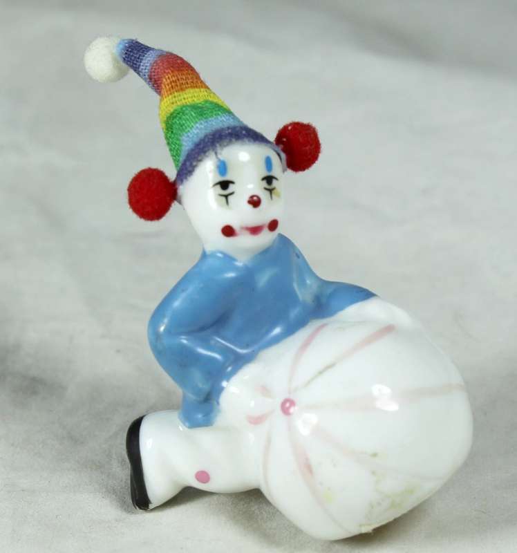 Miniature clown with ball