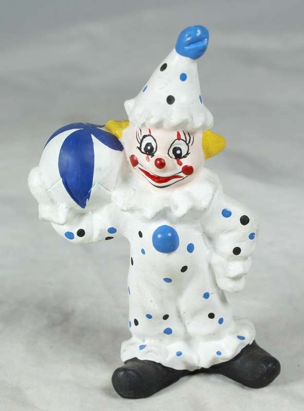 Clown with blue & black dots and ball