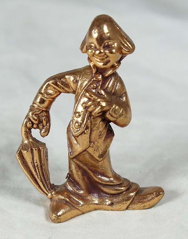 Golden lead figurine - clown with umbrella