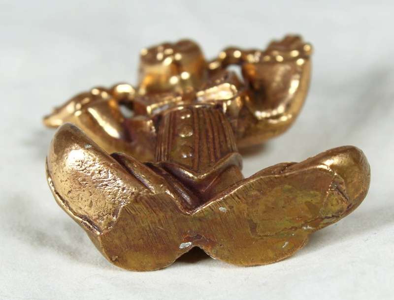 Golden lead figurine - funny face clown