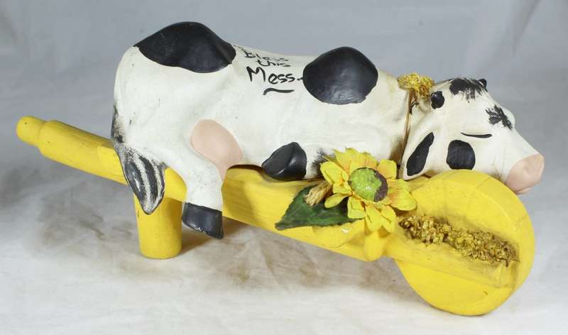 Bless this mess - cow on wheelbarrow