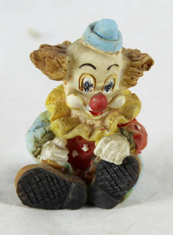 Small seated clown