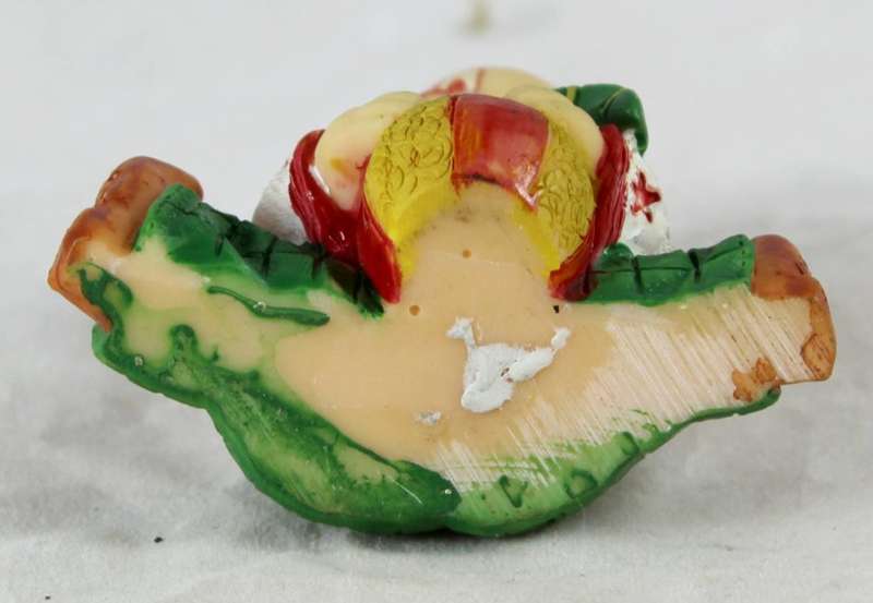 Small baby clown with ball