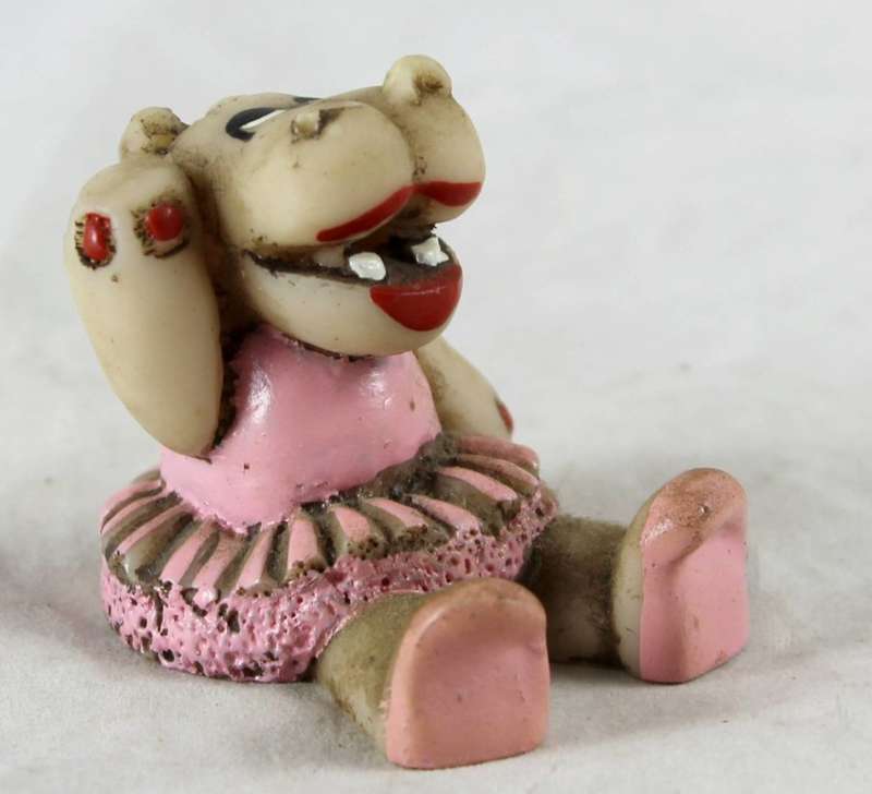 Miniature seated hippo with tutu
