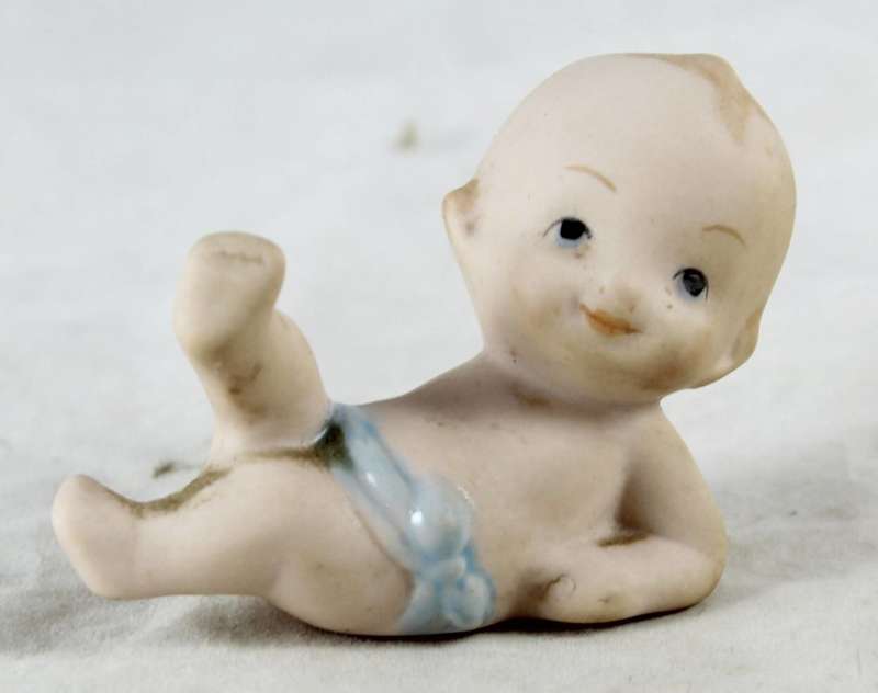 Miniature baby laying down