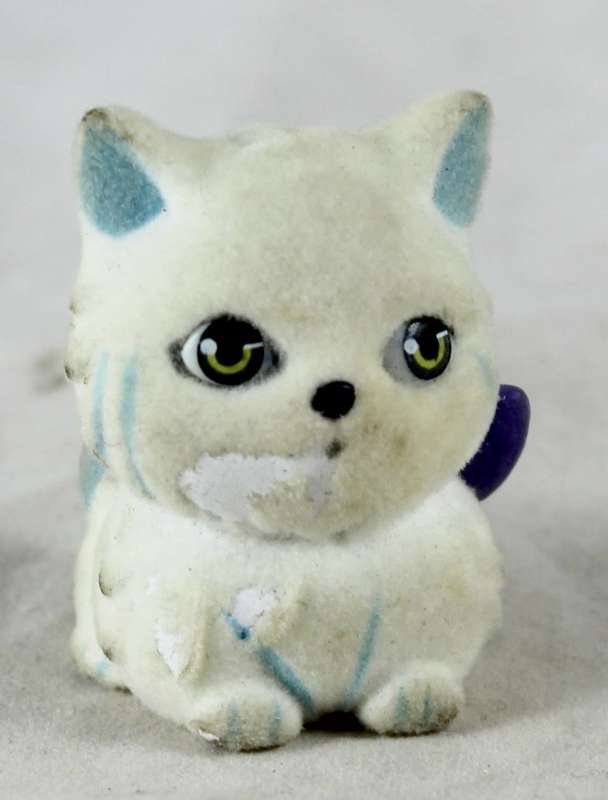 Miniature suede kitty with bow