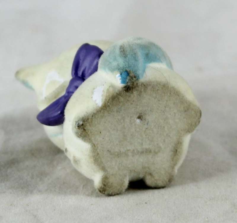 Miniature suede kitty with bow