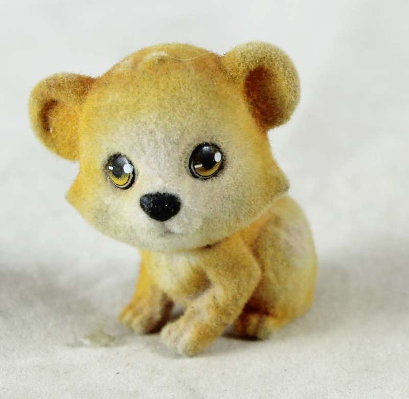 Miniature suede smiling puppy