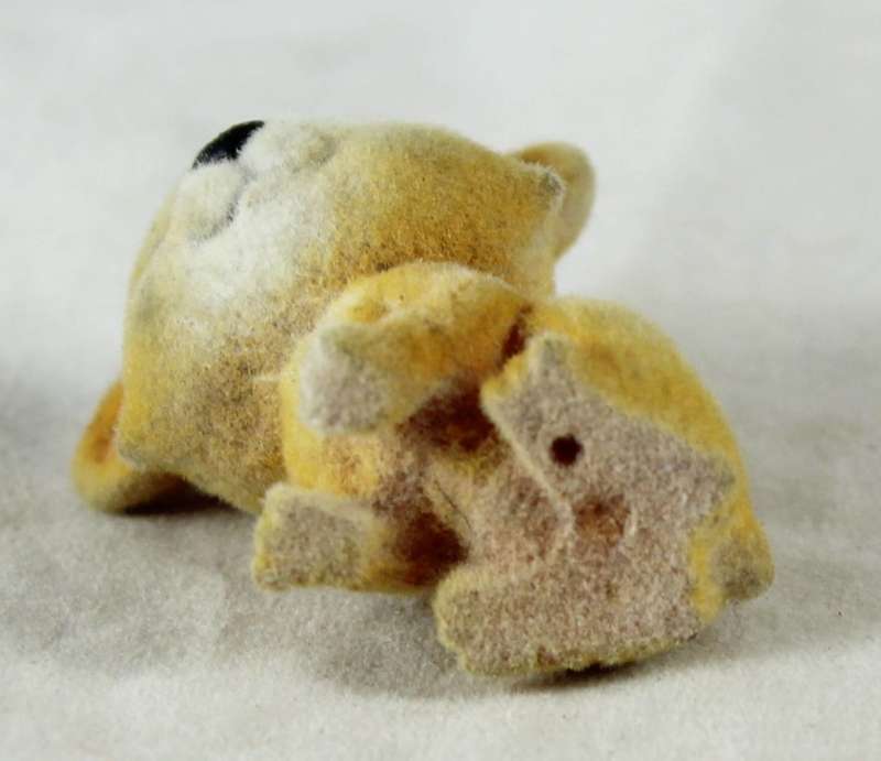 Miniature suede smiling puppy