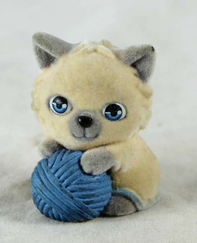 Miniature suede kitten with wool