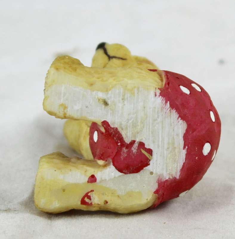Miniature seated bear