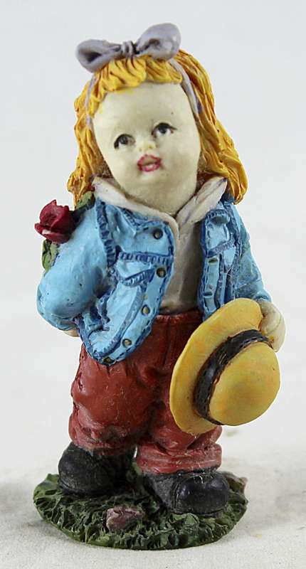 Miniature little girl with flower & hat