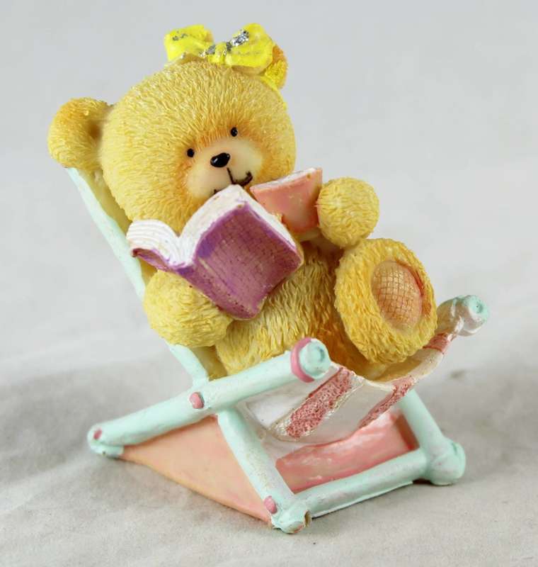 Bear on beach chair - reading book