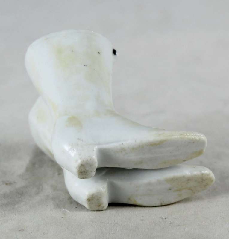 Pair of miniature white boots