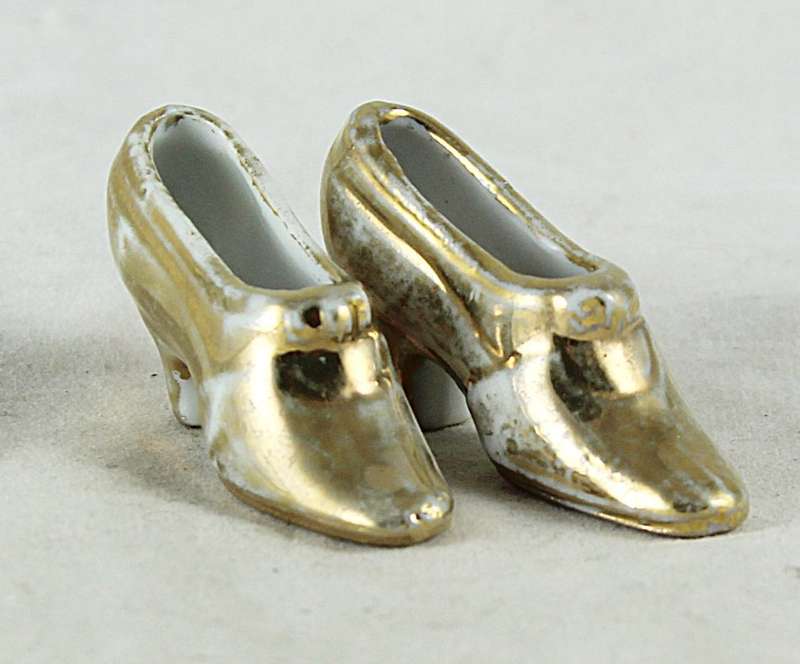 Miniature golden shoe pair