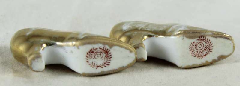 Miniature golden shoe pair