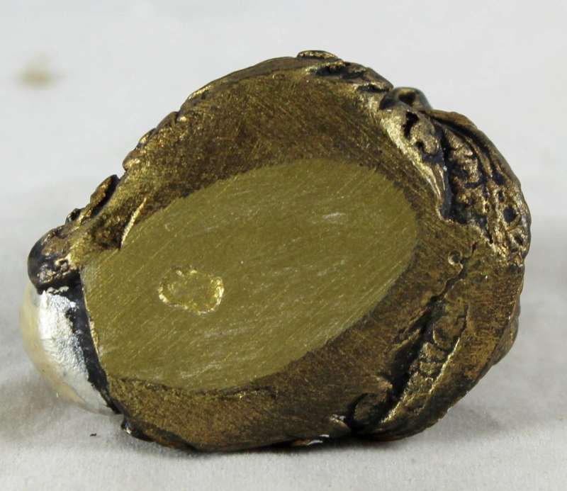 Small gold dragon with crystal ball