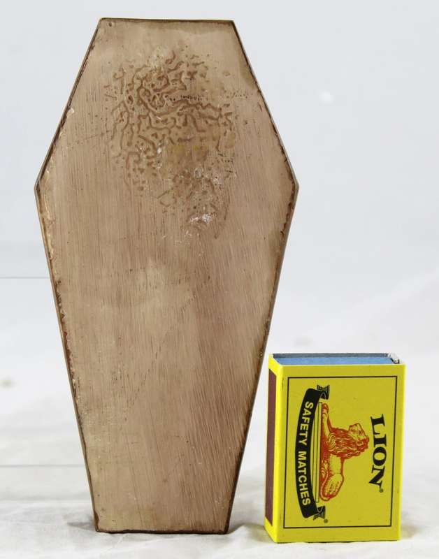 Wooden coffin with skeleton