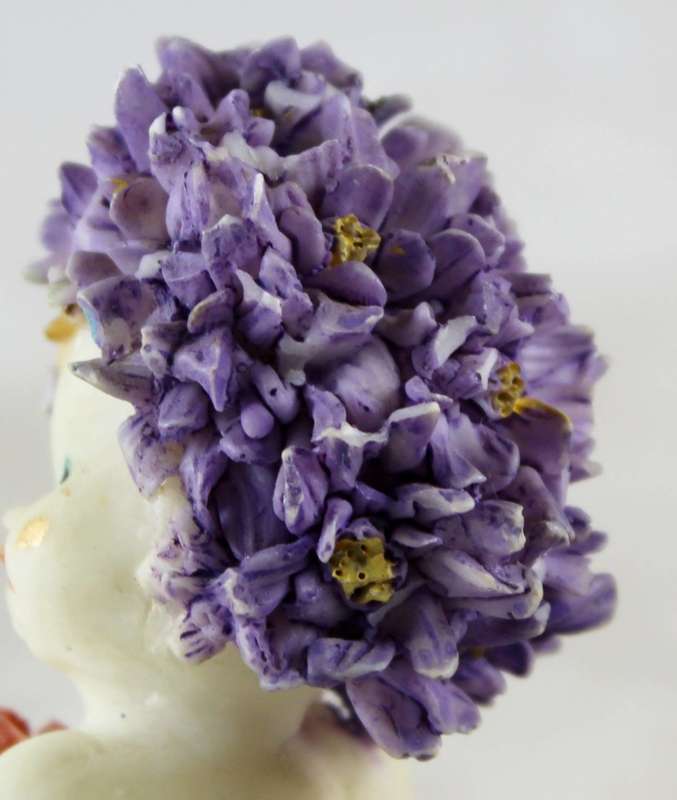 Baby with purple flower hair