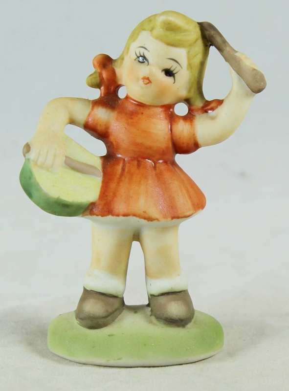 Girl playing a drum
