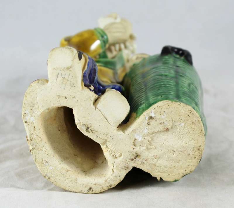 Mud man with big green pot