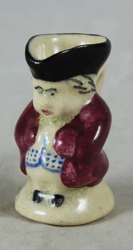 Miniature character jug - Man in brown jacket