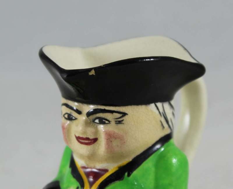 Small Character Jug Man in Green Jacket Drinking Beer