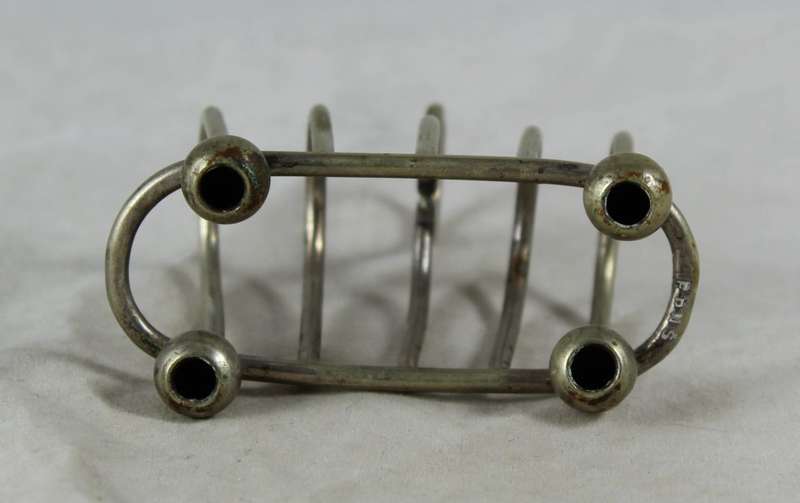 Very small silver plated bread rack