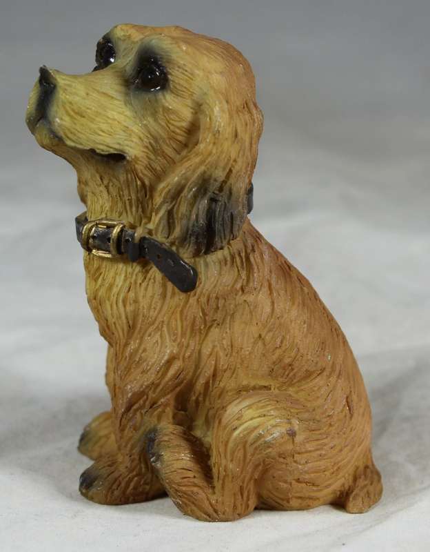 Seated spaniel