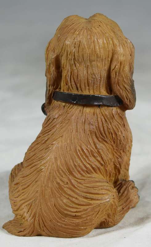 Seated spaniel