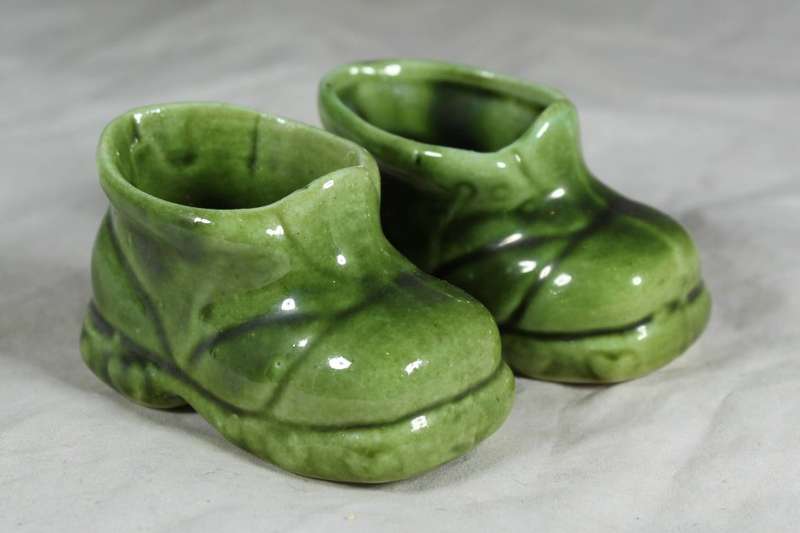Small pair of green porcelain booties