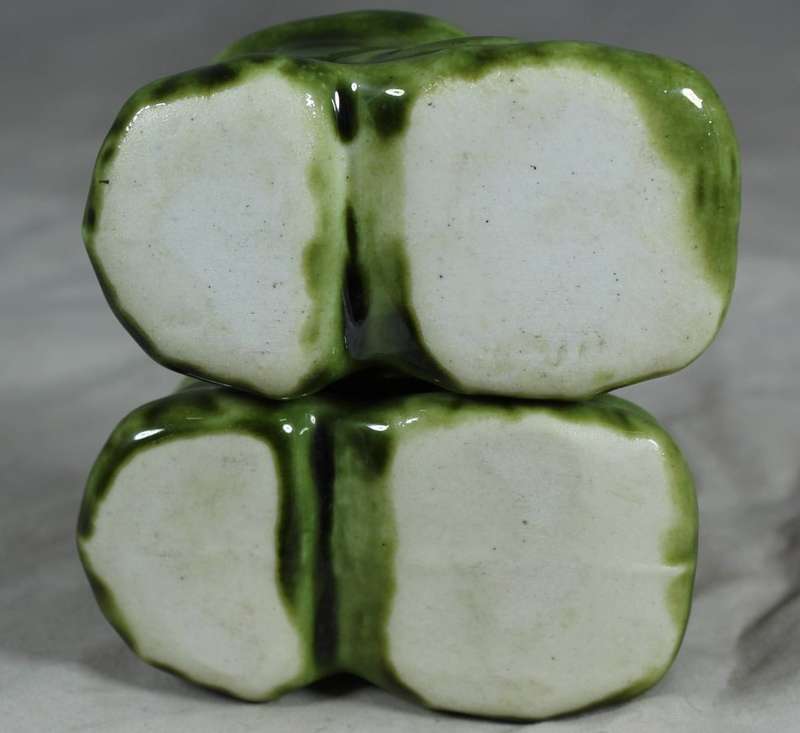 Small pair of green porcelain booties