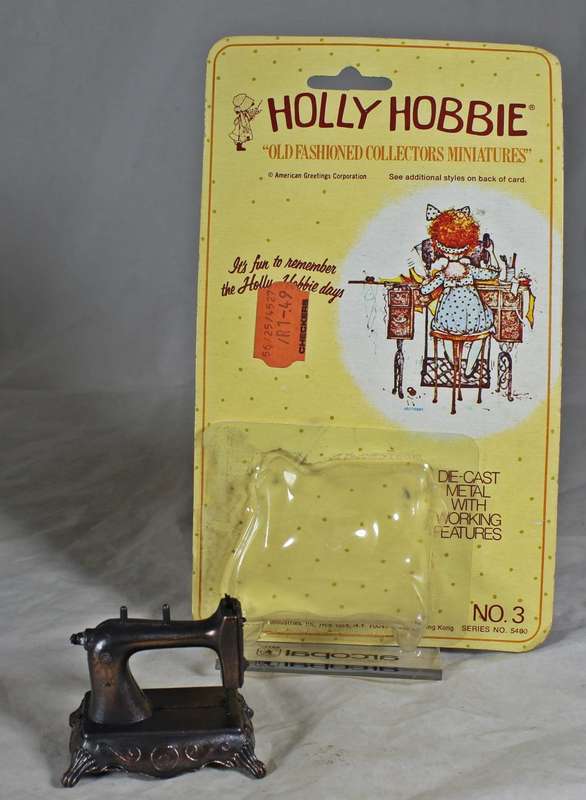 Holly Hobbie (1977) Diecast Metal-Box included but not sealed-Sewing Machine with moveable Parts