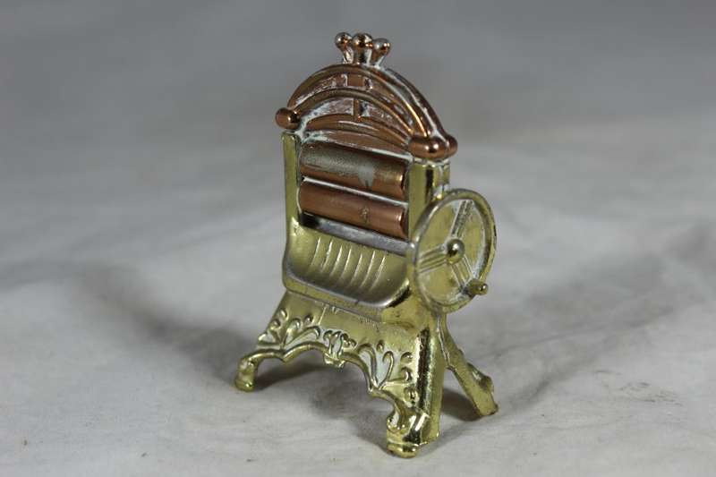 Bronze miniature washing press
